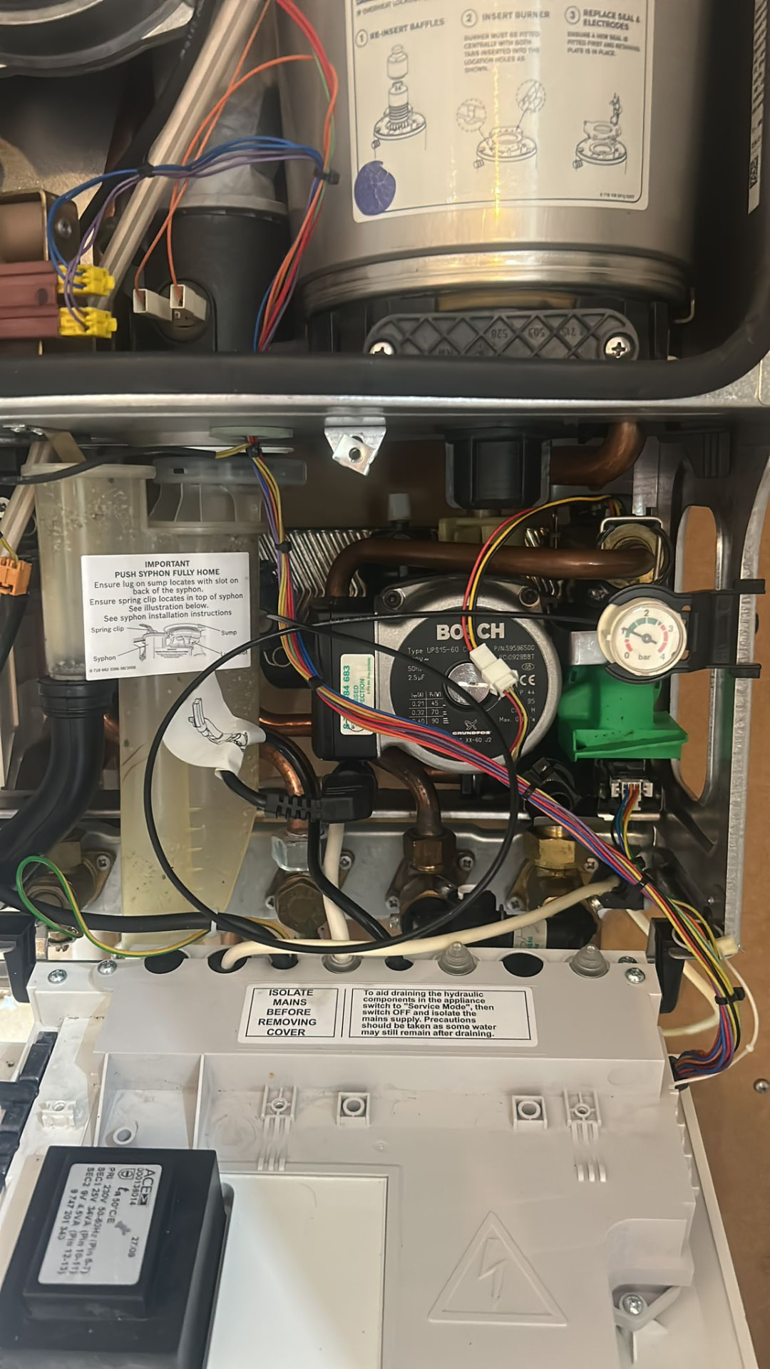 Internal boiler pump and components during a repair, Liverpool