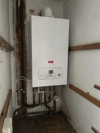 Utility room boiler installation in Eccleston Park