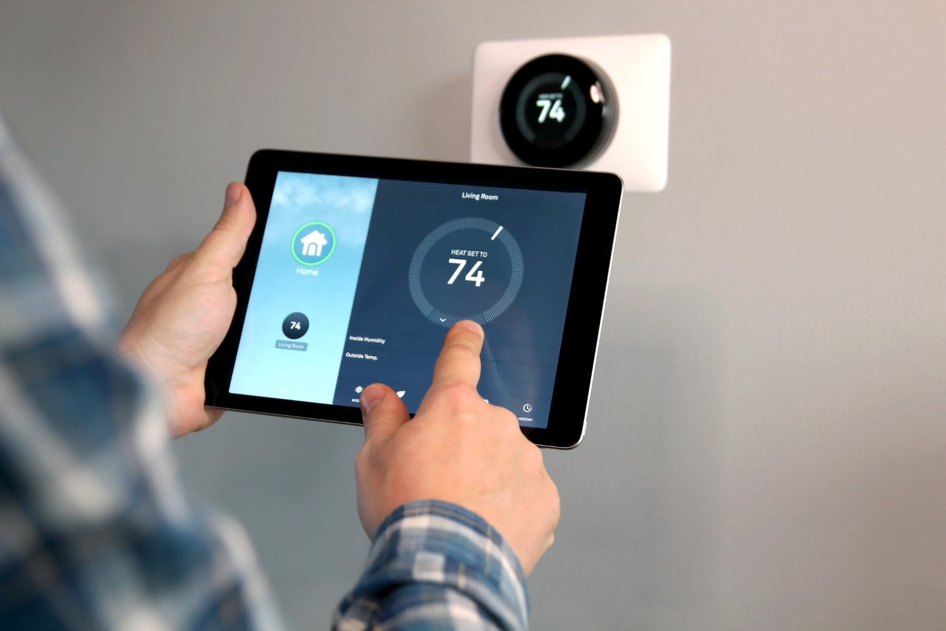 Smart heating controls being set from a tablet, Liverpool